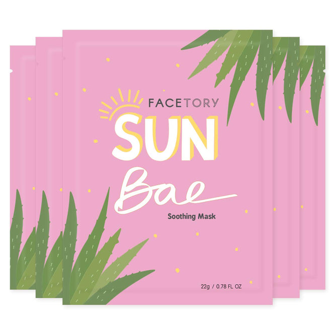 The Sun Bae SOOTHING Sheet Mask by FaceTory comes in pink packaging adorned with tropical leaves and a sun illustration. This 22g (0.78 fl oz) mask is infused with aloe leaf extract, providing a calming skincare experience.