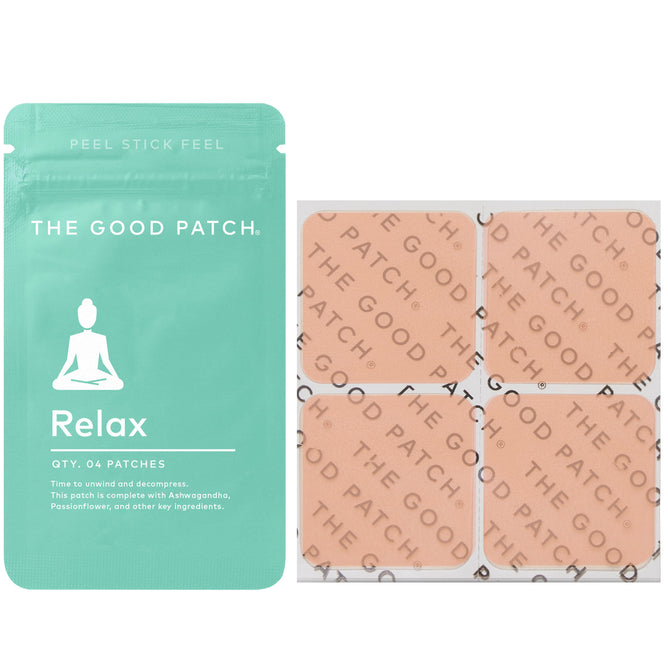 A teal package labeled Relax Plant Patch from The Good Patch rests beside four square patches with a meditating silhouette, featuring Ashwagandha for enhanced relaxation, each patch boldly displaying THE GOOD PATCH.