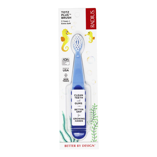The Totz Plus Toothbrush by Radius is designed for children aged 3 and up. It has a blue non-slip handle, super-soft bristles, and is made in the USA. The packaging features seahorses and seaweed, promoting an improved grip for growing hands.