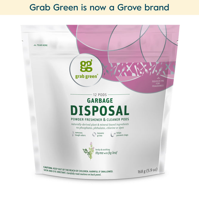 A white and pink resealable pouch of grab green Garbage Disposal Freshener & Cleaner Pods - Thyme with Fig Leaf (Coming Soon!), contains 12 vegan, paraben-free pods. Top banner: Grab Green is now a Grove brand.