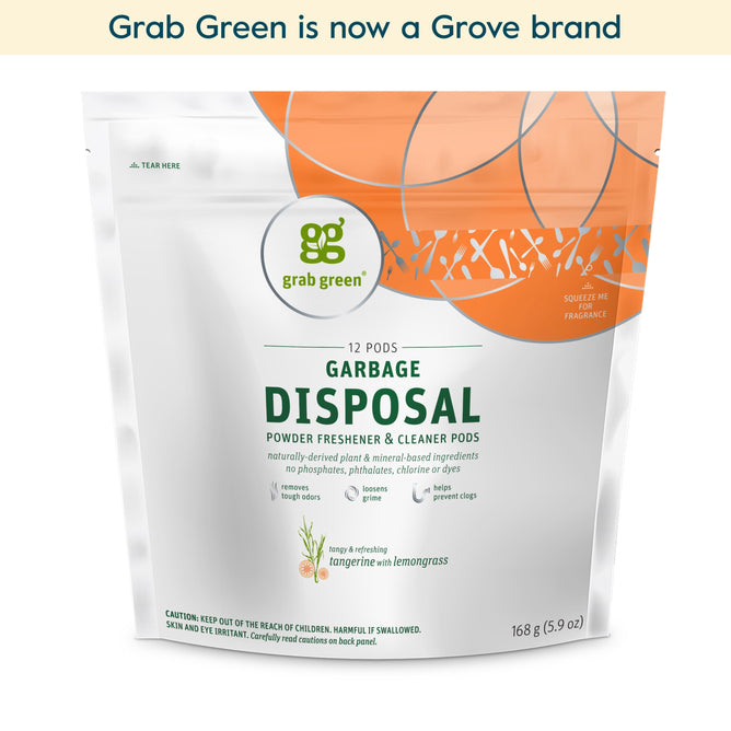 A stand-up pouch of grab green Garbage Disposal Freshener & Cleaner Pods - Tangerine with Lemongrass (Coming Soon!) features orange and green accents on white packaging to fight grime buildup.