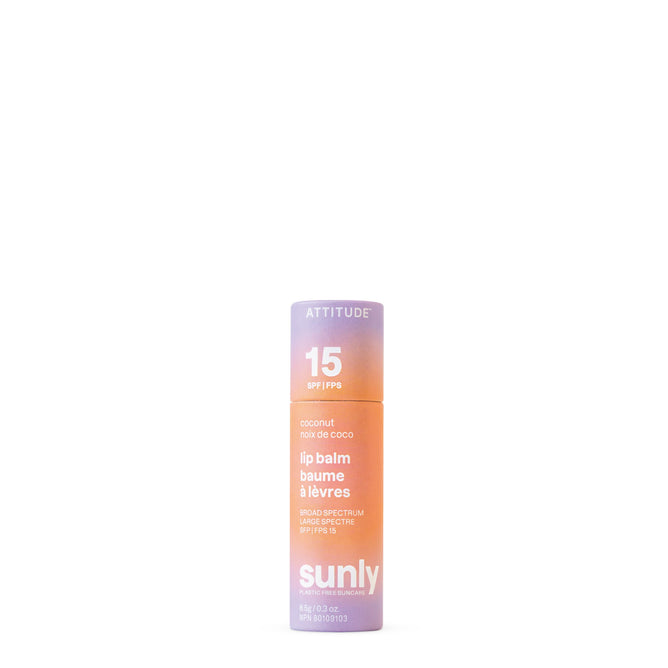 A tube of ATTITUDE Sunly Lip Balm SPF15 with non-nano zinc oxide and coconut flavor. The gradient packaging blends purple, orange, and peach colors, featuring English and French white text product details.