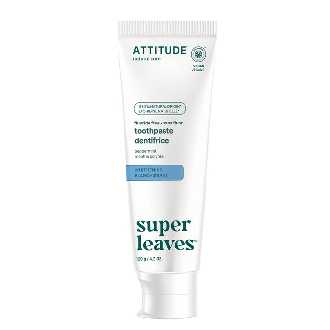 A white tube of ATTITUDE super leaves Fluoride-free Toothpaste - Whitening with peppermint flavor, made from naturally derived ingredients and non-nano hydroxyapatite, stands upright against a plain white background.