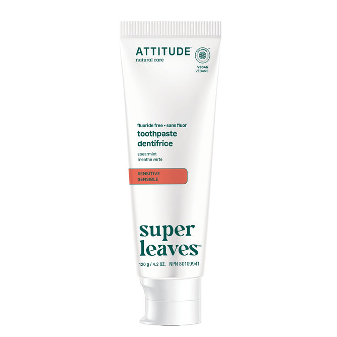 A white tube of ATTITUDE super leaves Fluoride-free Toothpaste for sensitive teeth, vegan and naturally sourced, with a refreshing spearmint flavor.