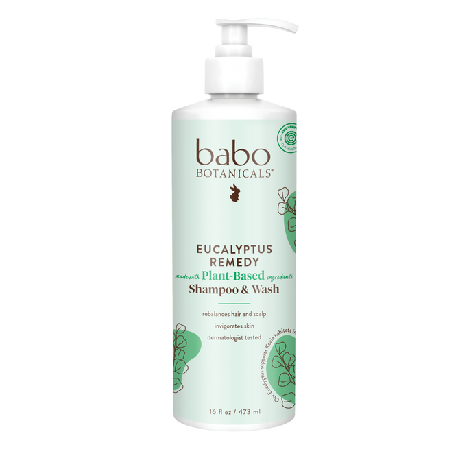 A white pump bottle of Babo Botanicals Eucalyptus Remedy Shampoo & Wash features green accents, botanical illustrations, and is labeled for rebalancing hair and scalp with sustainably sourced eucalyptus oil; dermatologically tested.