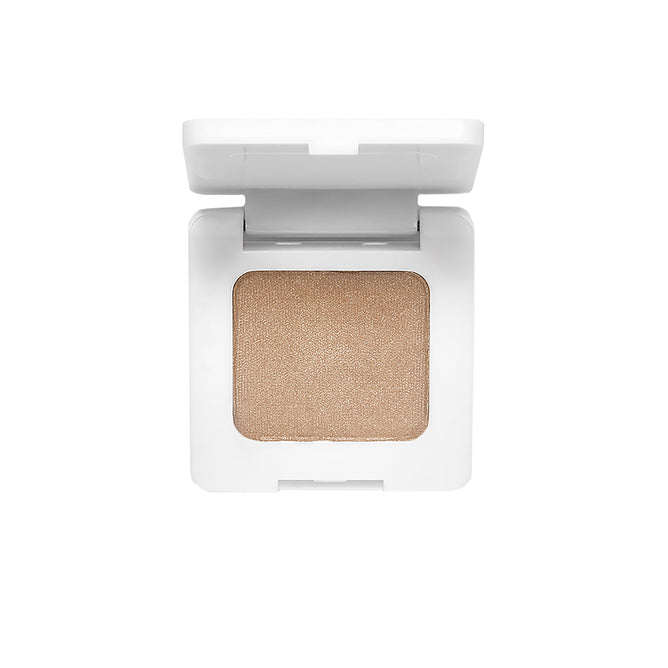 An open white compact of RMS Beauty Back2Brow Powder displays a single square pan of long-wearing, cleanly-formulated beige or champagne brow powder, shown against a plain white background.