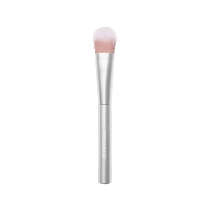 The RMS Beauty Skin2Skin Everything Brush features a silver handle and soft, rounded bristles—white-tipped with a pink base—designed for versatile use, displayed on a plain white background.