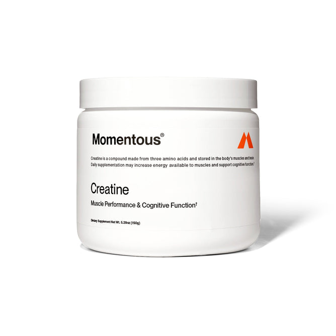 A white container of Momentous Creatine - Creapure features black and orange text, highlighting this creatine monohydrate supplement designed for muscle performance and cognitive function.