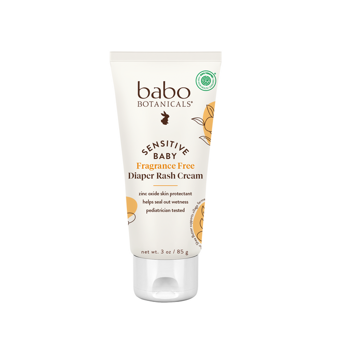 A 3 oz tube of Babo Botanicals Sensitive Baby Zinc Diaper Rash Cream rests on a white background, with soft yellow packaging accents and plant-based ingredients that are gentle for delicate baby skin.