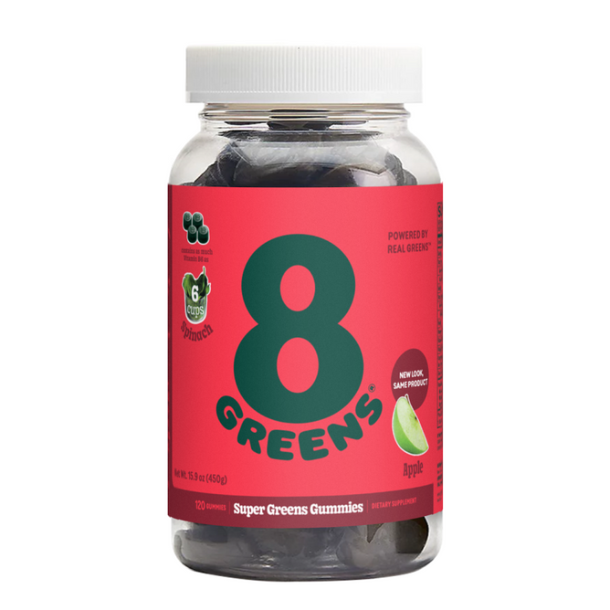 A jar of 8Greens Super Greens Gummies (QVC) features a red label with the number 8, indicating its apple-flavored. With an image of an apple slice, it contains 120 gummies powered by real greens to boost immunity.