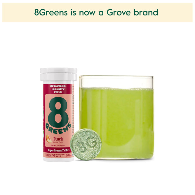 The image shows 8Greens packaging with a tube labeled Super Greens Tablet Peach and an effervescent green tablet imprinted with 8G. A glass filled with green liquid is next to it. Above, the text declares 8Greens is now a Grove brand, offering tablets for metabolism support and immunity boost.