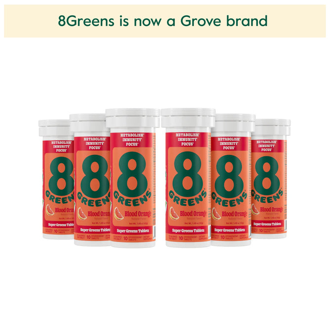 An image shows six orange and green tubes labeled Super Greens Tablet - Blood Orange arranged in two rows. At the top, text reads 8Greens is now a Grove brand. These tablets support metabolism and boost immunity, ideal for health-conscious individuals looking to enhance their wellbeing.
