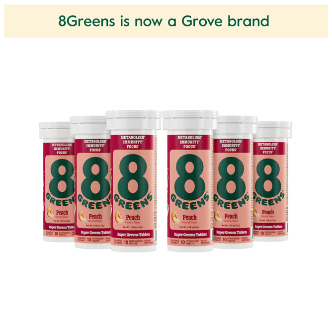 An image shows six tubes of 8Greens Super Greens Tablet - Peach in a row. A banner above reads, 8Greens is now a Grove brand, with packaging featuring bold green 8 logos and orange accents, emphasizing its benefits for immunity boost and metabolism support.