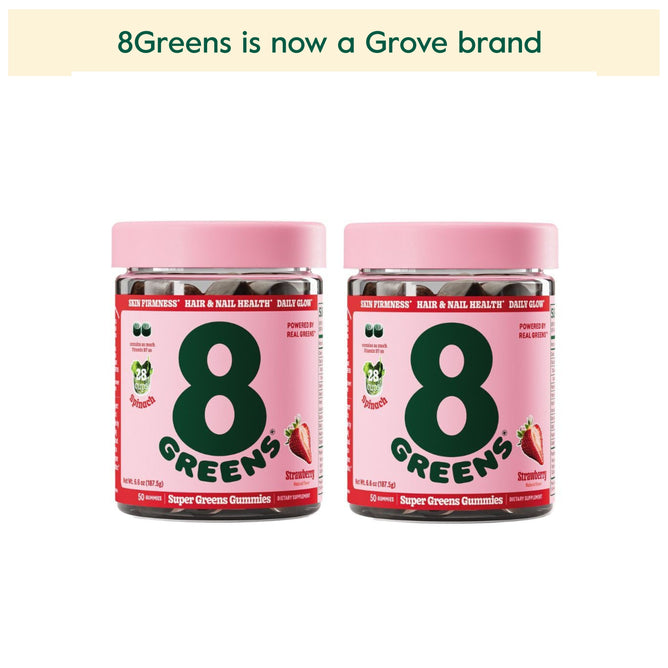 Two jars of 8Greens Super Greens Gummies - Beauty with pink lids in strawberry flavor, featuring 8 real greens. Text above reads 8Greens is now a Grove brand. The jars stand side by side on a white background, embodying the essence of Beauty Gummies.