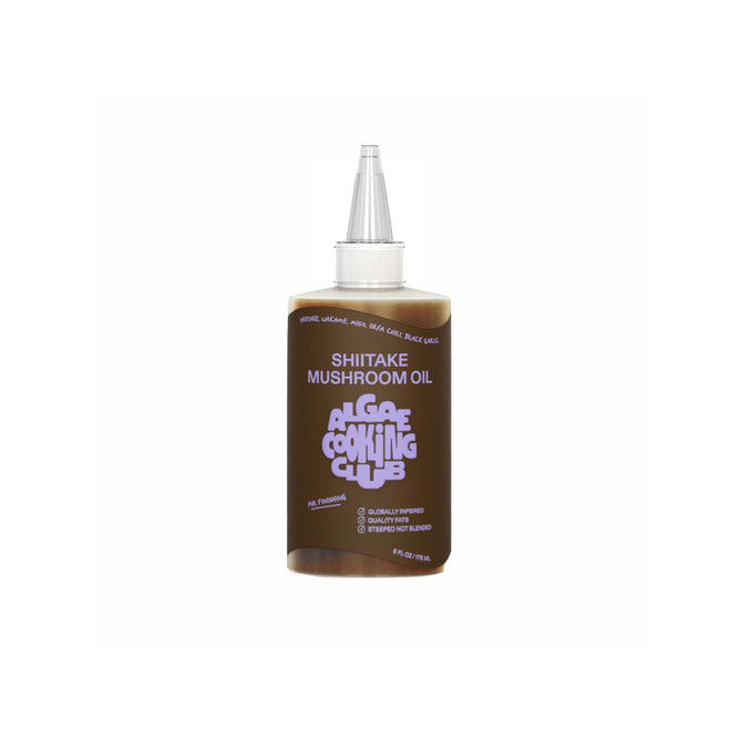 The Shiitake Mushroom Oil by Algae Cooking Club features purple text on a brown background and includes a pointed cap for easy dispensing.