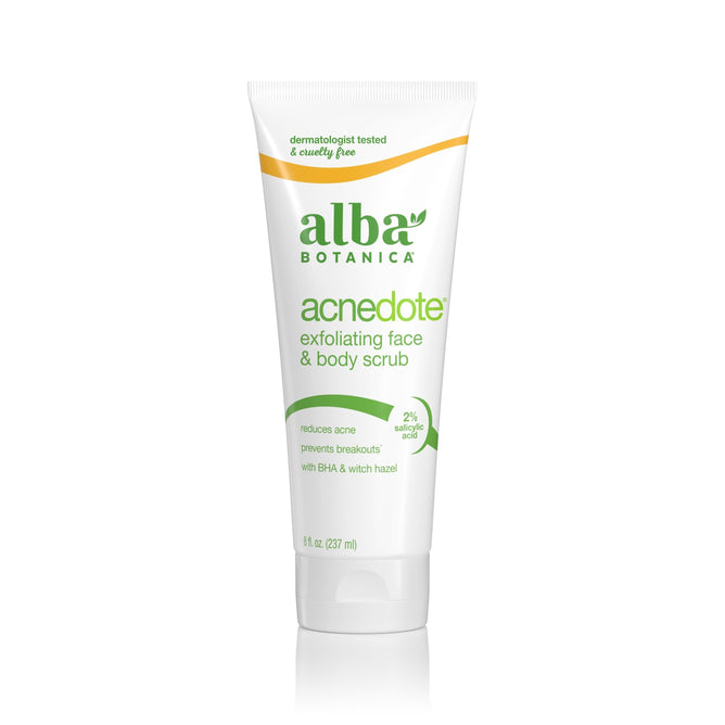 A white tube of Alba Botanica AcneDote Face & Body Scrub with green text, featuring salicylic acid to target breakouts and a yellow curved label that says dermatologist tested and cruelty free.