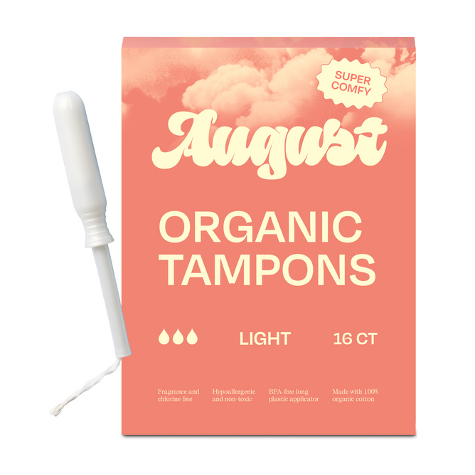 A box of August Light Tampons, 16 count, features a cloud design and is made with 100% organic cotton. BPA-free applicators and a hypoallergenic formula are included. One tampon is shown beside the box.