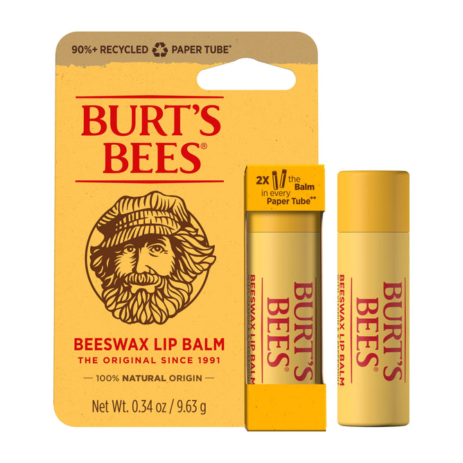 Packaging image of Burts Bees Beeswax Lip Balm Paper Tube shows two beeswax-infused tubes. The design includes 90%+ recycled paper, a bearded man illustration, and highlights natural origin, weight, and peppermint oil content.