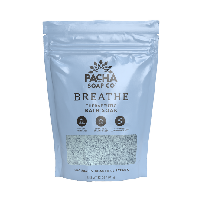 A 32 oz (907 g) blue resealable bag of Pacha Soap Co. Breathe Salt Soak made with Epsom salts, eucalyptus oil, botanical oils, and soothing aromatherapy scents for a relaxing bath experience.