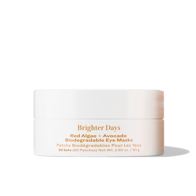 A white Three Ships Brighter Days Red Algae + Avocado Eye Mask container with gold and orange text; 30 sets (60 patches), 2.92 oz, designed to depuff and brighten under eyes.