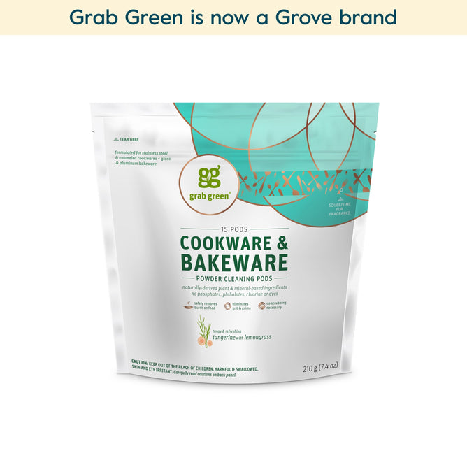 A standing pouch of grab green Cookware & Bakeware Cleaner Pods – Tangerine with Lemongrass, in a green and teal design, labeled 15 pods. Text above says, “grab green is now a Grove brand.” (Coming Soon!).