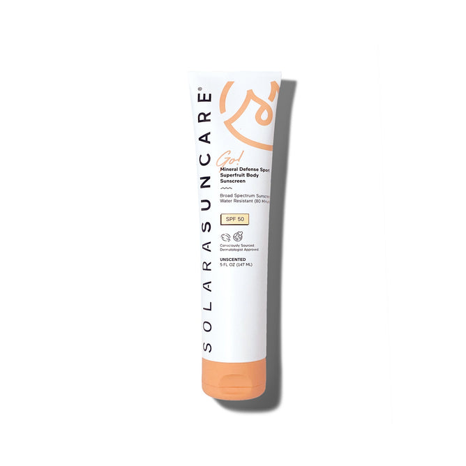 A white tube of Solara Suncare Go! Mineral Defense Sport: Superfruit Body Lotion, SPF 50, with an orange cap and accents, stands upright against a plain white background.