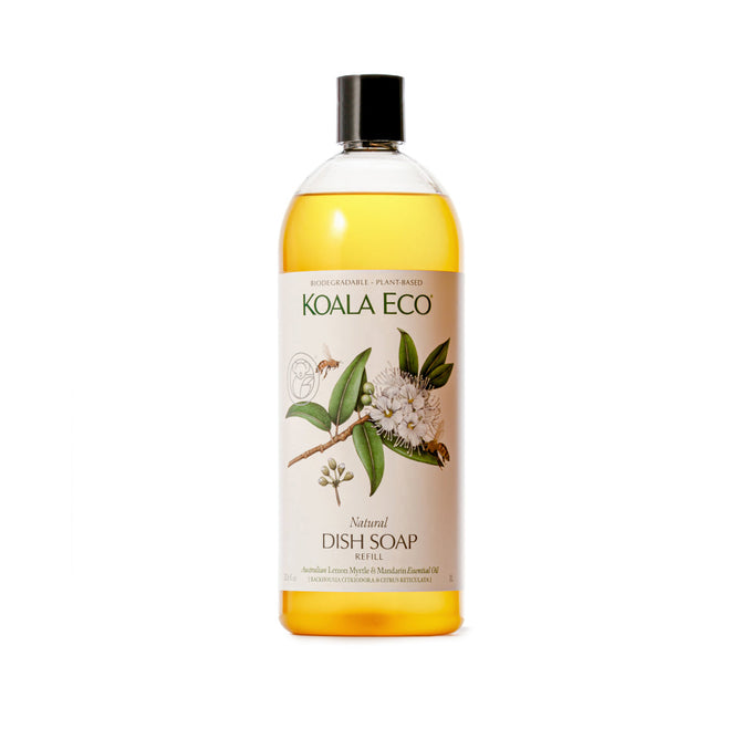 A Koala Eco Dish Soap Refill features an eco-friendly formula with yellow liquid. The label has botanical illustrations, branding, and highlights Australian essential oils such as Lemon Myrtle and Mandarin for a plant-based clean.