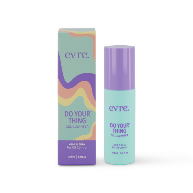 A 100ml purple and turquoise bottle of evre. Do Your Thing AHA & BHA Gel Cleanser for Oil Control, featuring gentle exfoliation and niacinamide, stands beside its colorful wave-adorned box.