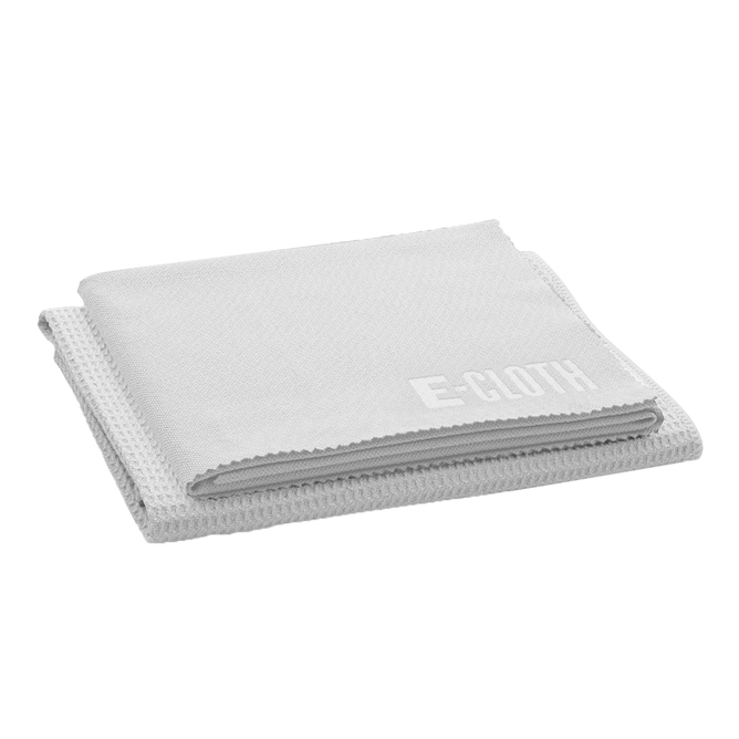 A folded beige cleaning cloth, branded with E-Cloth in white letters, lies against a white background. Its part of the Recycled Plastic Window Cleaning Kit and is crafted from premium microfiber to withstand numerous uses, making it an excellent reusable cleaning tool.