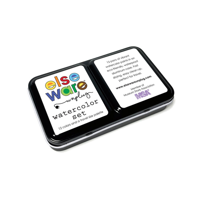 The Elseware Unplug Watercolor Set features a black metal tin with colorful lettering, 12 watercolor paints, a travel-size palette, and an eco-friendly aluminum case—perfect for sketchbooks and mixed media projects on the go.