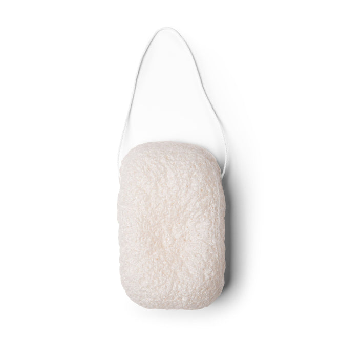The Konjac Body Sponge by Everist is a rectangular, off-white textured sponge made from natural konjac plant fibre with a white hanging loop. Gentle on skin and fully compostable, its shown on a white background.