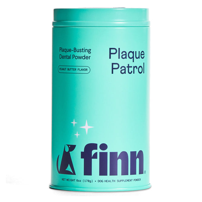Finn Dog Plaque Patrol Dental Powder comes in a teal canister with simple graphics and dark blue text. Made from natural ingredients and peanut butter flavored, it supports dogs’ dental health.
