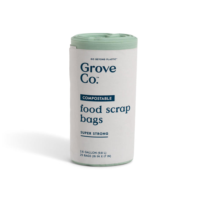 A roll of Grove Co. Compostable Food Scrap Bags with a white and light green label, featuring 25 super strong 2.6-gallon bags—ideal for kitchen composting.