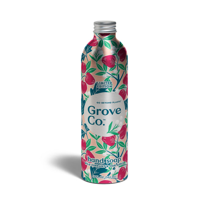 Grove Co. Hand Soap Refill - Fall Collection comes in a recyclable metallic aluminum bottle with wild currant and cava flower scent, colorful red and green floral design, and is labeled as a limited edition.