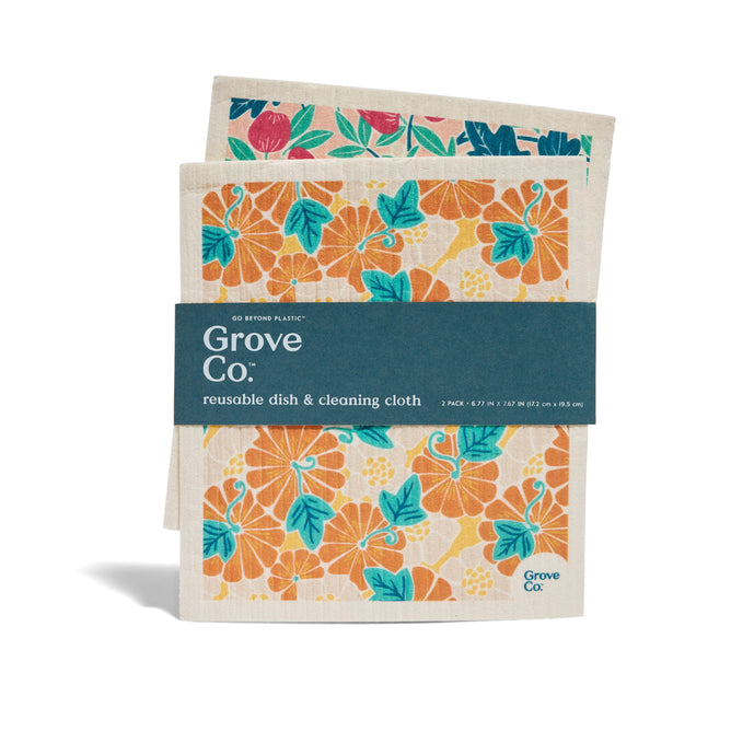 Grove Co.s Swedish Dish Cloths - Fall Collection includes two limited-edition reusable cloths with orange, teal, pink floral patterns for eco-friendly cleaning. The set comes wrapped in a blue paper band.