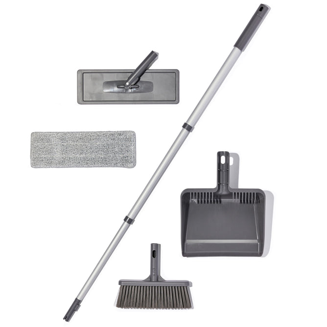 The Compact Microfiber Mop & Broom Set by Grove Co. offers a space-saving solution with a gray broom, dustpan, and collapsible mop. The mop features a rectangular head with a textured pad, all made from recycled materials, and the broom and mop share a detachable handle for versatility.