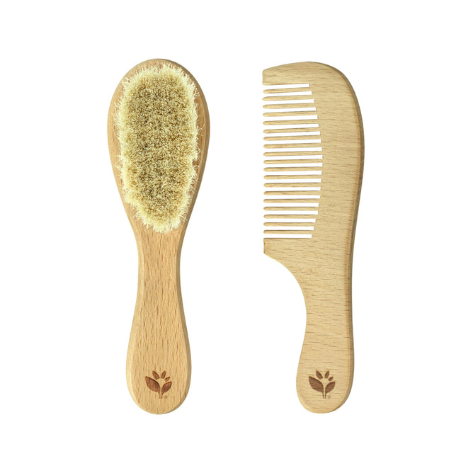 The Green Sprouts Baby Goat-Hair Brush & Comb Set includes an eco-friendly wooden brush with soft bristles and a fine-tooth comb, both adorned with a small leaf logo.