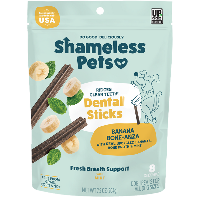 Shameless Pets Banana Bone-anza Dental Stick, a grain-free dog treat in a yellow and blue pack with banana and mint, supports fresh breath for dogs of all sizes.