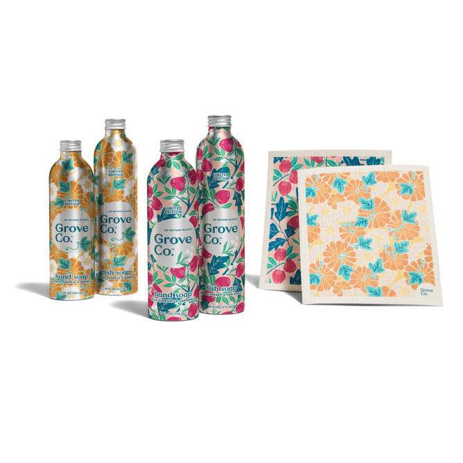 The Grove Co. Sinkside Set - Fall Collection features four floral aluminum bottles and two patterned, eco-friendly dishcloths—one with pink and green leaves, the other with yellow hibiscus flowers—displayed on a white background.
