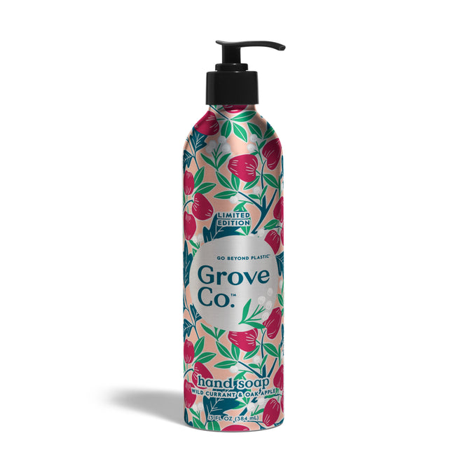 A metallic pump bottle of Grove Collaborative Hand Soap Refill + Pump - Fall Collection features a colorful floral pattern, black pump top, and label reading Limited Edition, Go Beyond Plastic, and Wild Currant & Cucumber.