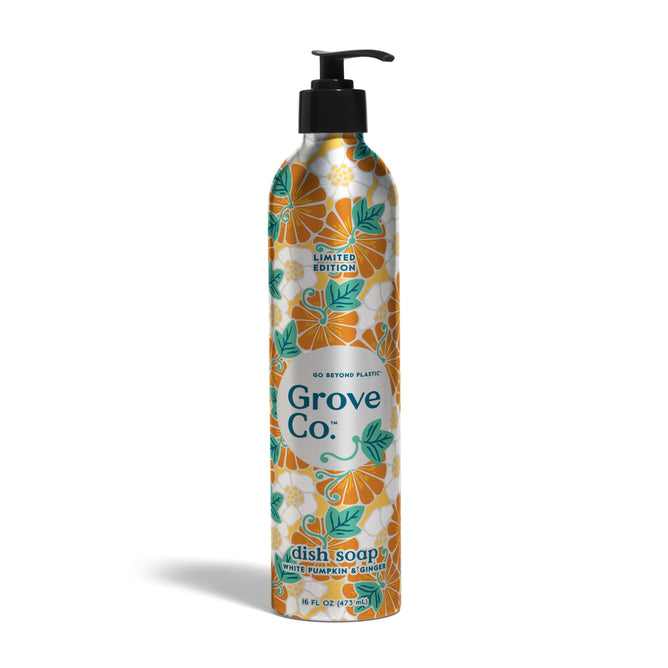 A tall, metallic pump bottle of Grove Collaborative Dish Soap Refill + Pump - Fall Collection features an orange pumpkin and green leaf design. The label says Limited Edition Natural Pumpkin & Clove, shown against a white background.
