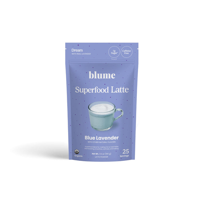 A light purple pouch labeled blume Organic Blue Lavender Latte Powder features a mug of frothy latte. This organic, caffeine-free blend provides 25 servings of a calming bedtime drink.