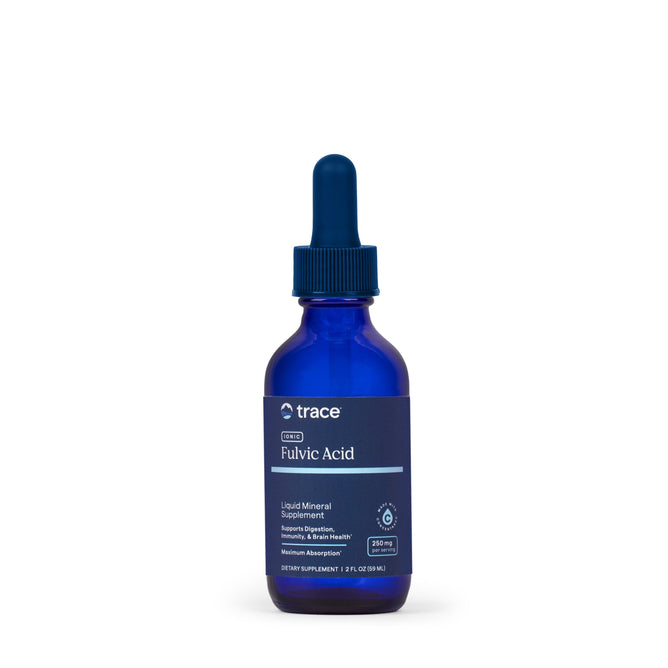 A blue glass dropper bottle labeled Trace Minerals Liquid Ionic Fulvic Acid with ConcenTrace®, 250 mg, features white and light blue text describing it as a dietary supplement with ionic trace minerals for immune and brain health.