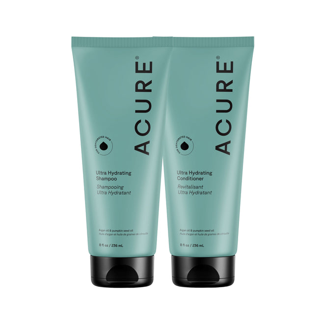 Two teal tubes of Acure Ultra Hydrating Shampoo and Conditioner Set, 8 fl oz (236 ml) each with black caps, featuring a hydrating formula with organic pumpkin seed and argan oils, displayed on a minimalist white background.