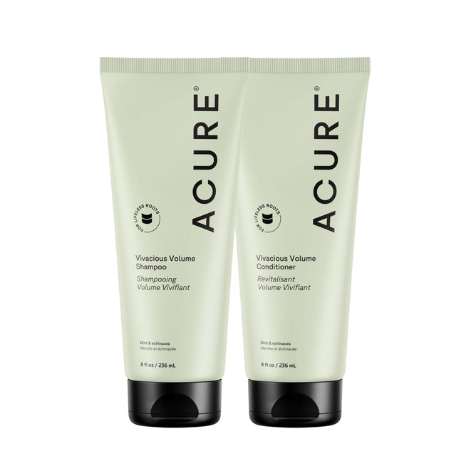 Two light green 8 fl oz tubes of the Acure Vivacious Volume Shampoo and Conditioner Set stand side by side with black caps, featuring bold black text and infused with moringa and mint.