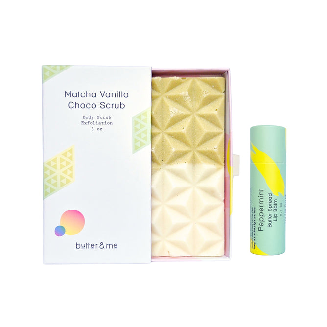 A box labeled Buy Choco Body Scrub, Get Lip Balm Free from butter & me, featuring a geometric body scrub and a mint green lip balm tube, displayed on a white background.