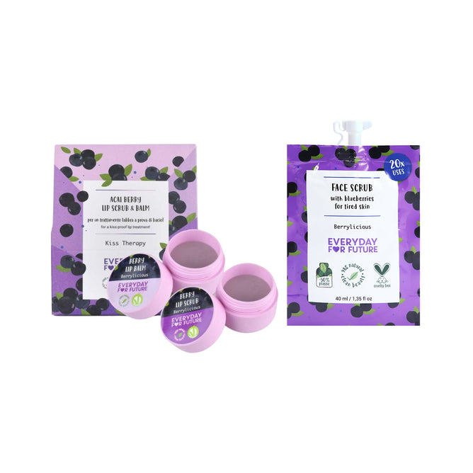Discover the purple-themed set Lip Balm & Scrub Kiss Therapy Starter Set + free gift by Everyday For Future, featuring a Berrylicious Lip Scrub and balm with organic acai berry in pink containers. It comes with a vegan, cruelty-free blueberry face scrub and berry-illustrated pouch.