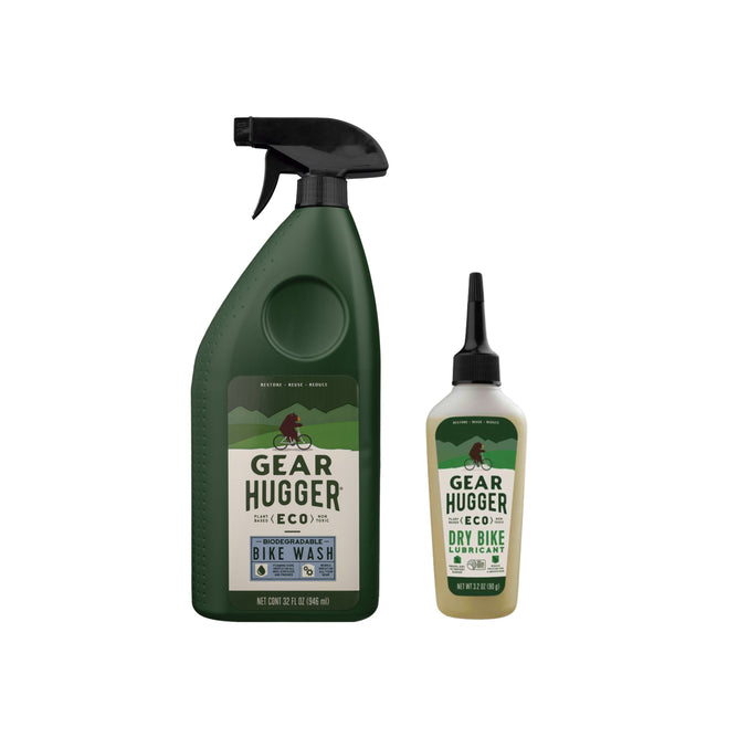 Two green Gear Hugger bottles: a large Eco Bike Wash spray and a smaller free gift, both with mountain graphics and eco-friendly branding—made with bio-based ingredients for easy, sustainable bike cleaning.