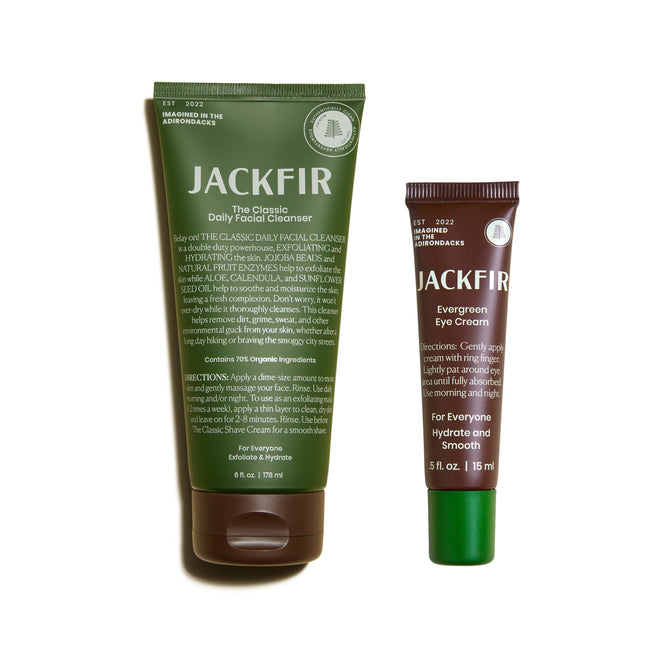 Two skincare products are showcased: a hydrating green tube labeled Jackfir The Classic Daily Facial Cleanser with a free gift and a smaller, exfoliating green tube labeled Jackfir Evergreen Eye Cream. Both feature product details on a pristine white background.