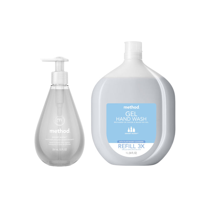 The method Gel Hand Soap Starter Set - Sweet Water includes a small pump dispenser and a large refill bottle, both with clear liquid and blue-white labels. Experience refreshing handwashing with no aluminum packaging.